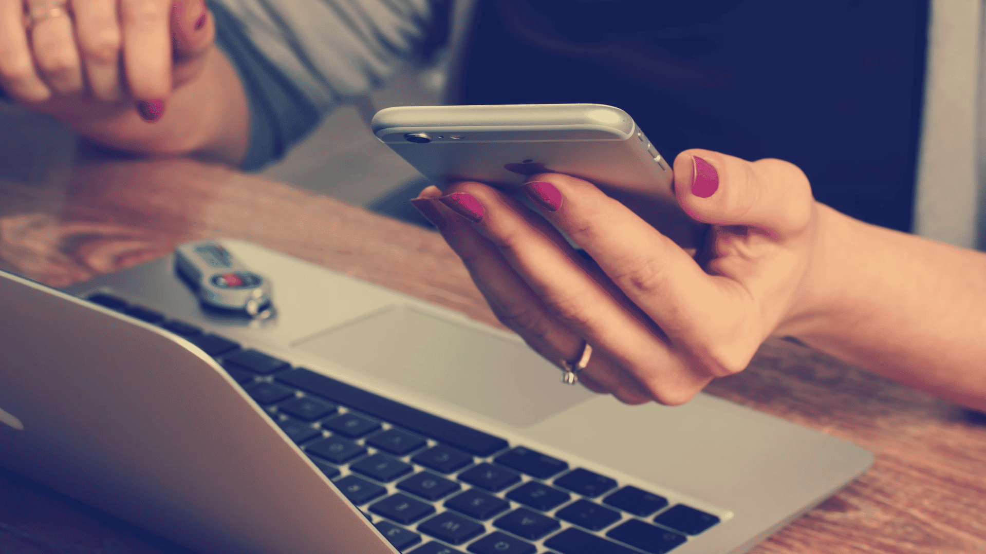 lady with phone and laptop